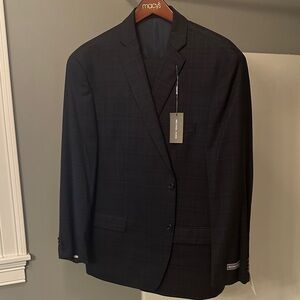 Calvin Klein plaid two piece Suit with tags brand new. Size 48R pants size 42w